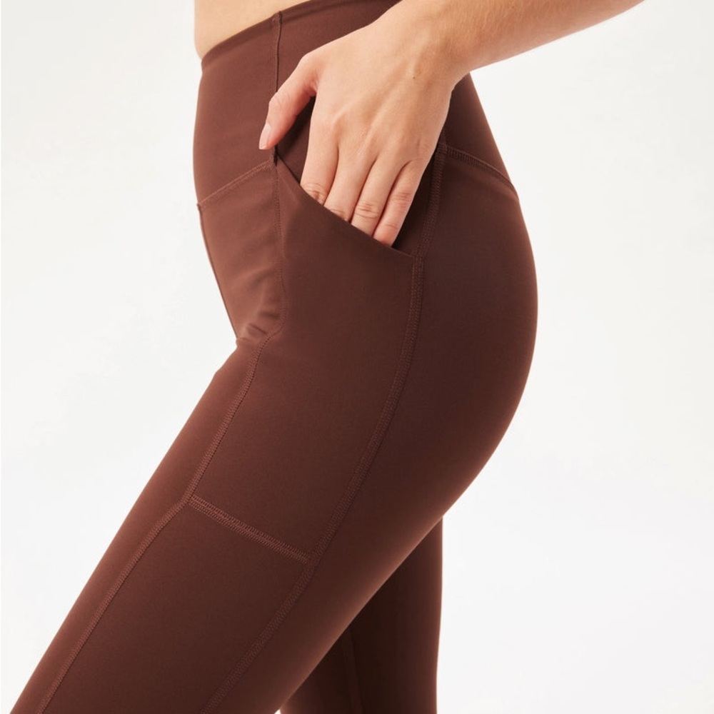 Girlfriend collective activewear set.  Bottoms are size medium, top size large